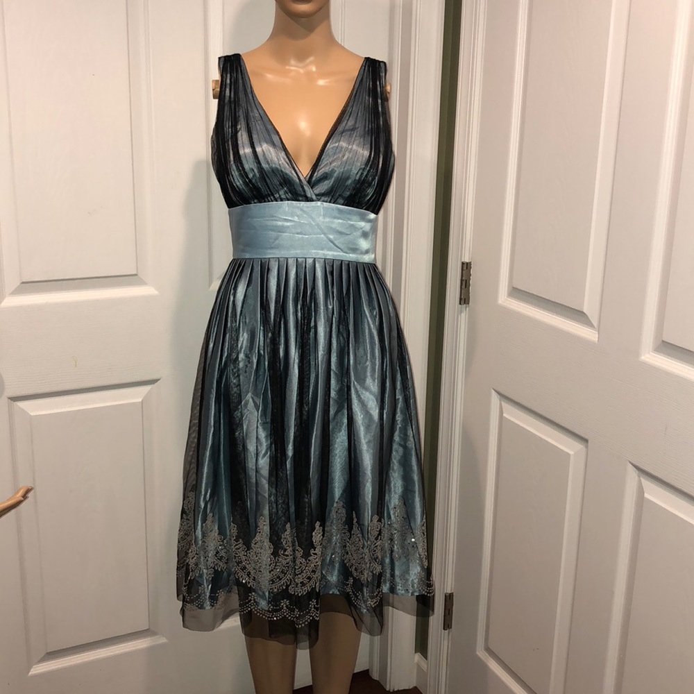 Davids bridal blue dress. 6